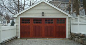 Brown real wood garage door with an overlay