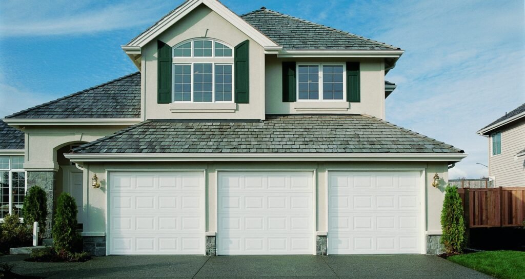 Three traditional short panel garage doors