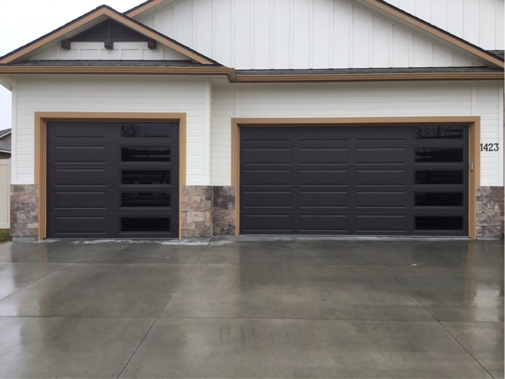 modern long panel garage door with windows
